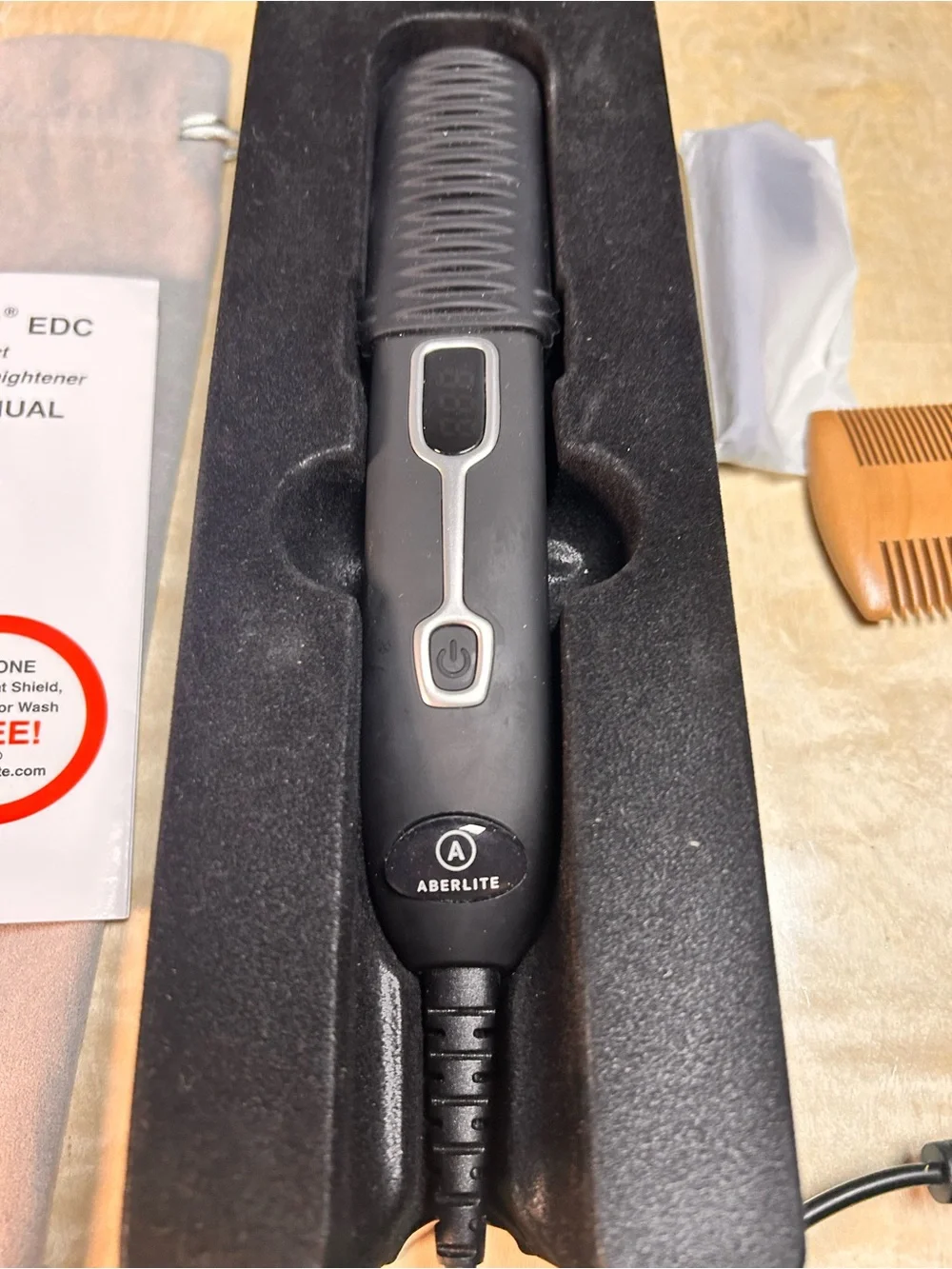 Aberlite edc beard and hair straightener.  Used once
